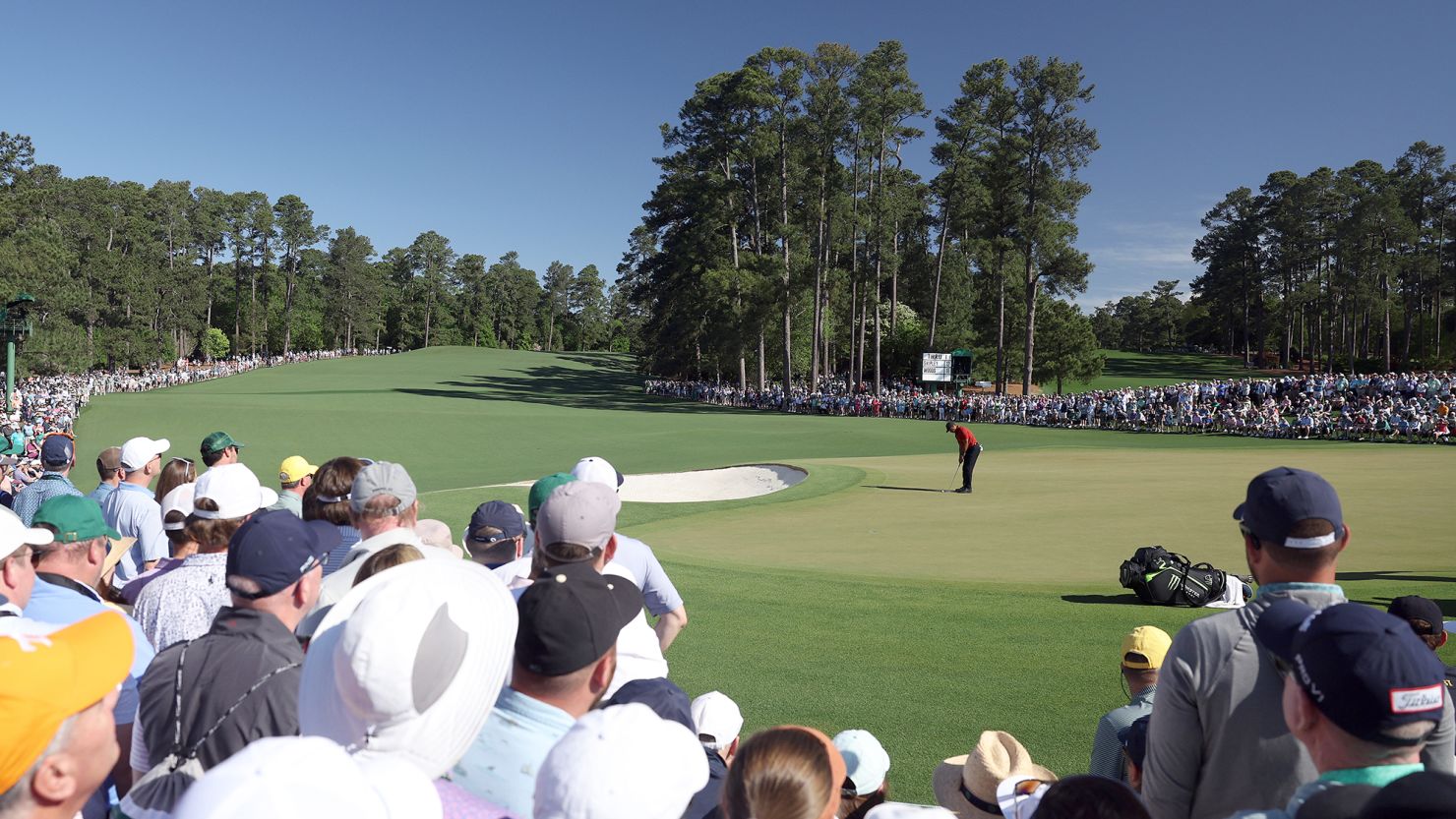 Tiger Woods putts on the second green during the final round of the 2024 Masters.